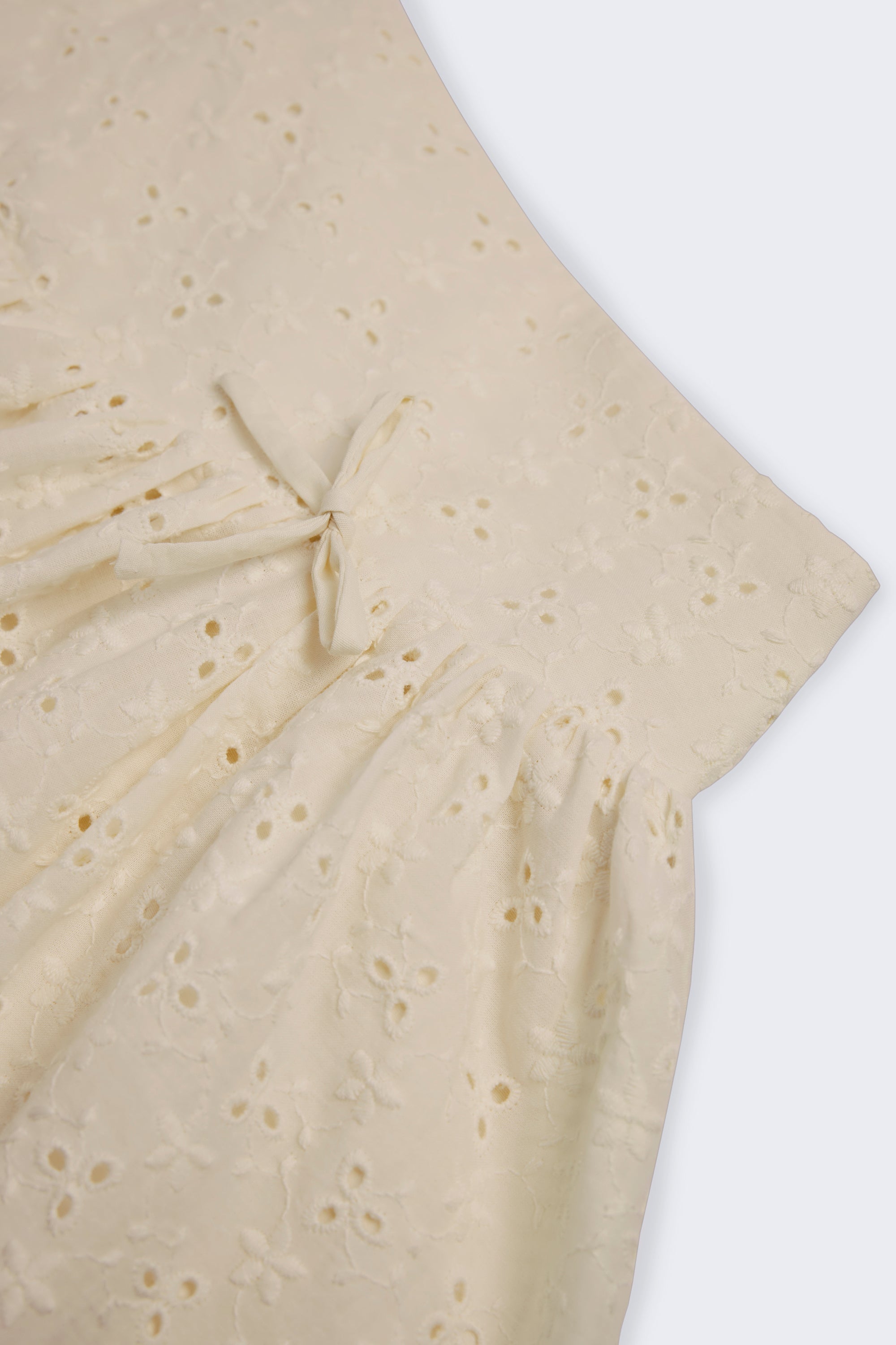 Bow-Detail Broderie Anglaise Mini Skirt in Ivory