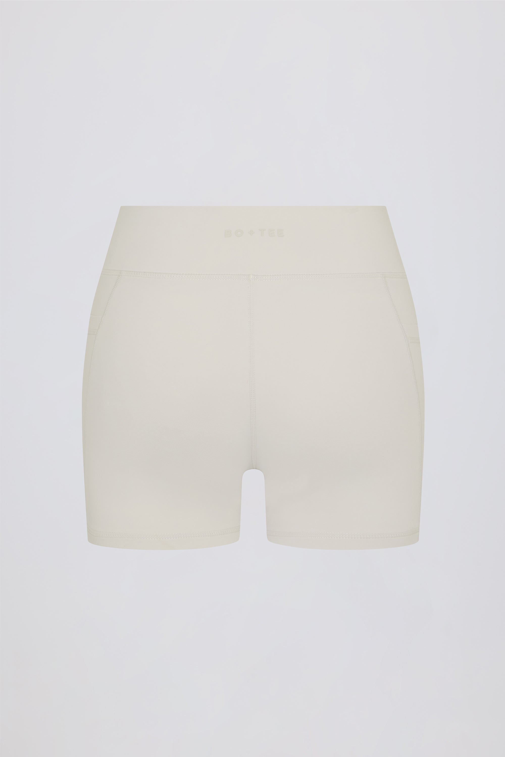 Soft Active Pocket V-Waist Mini Shorts in Cream