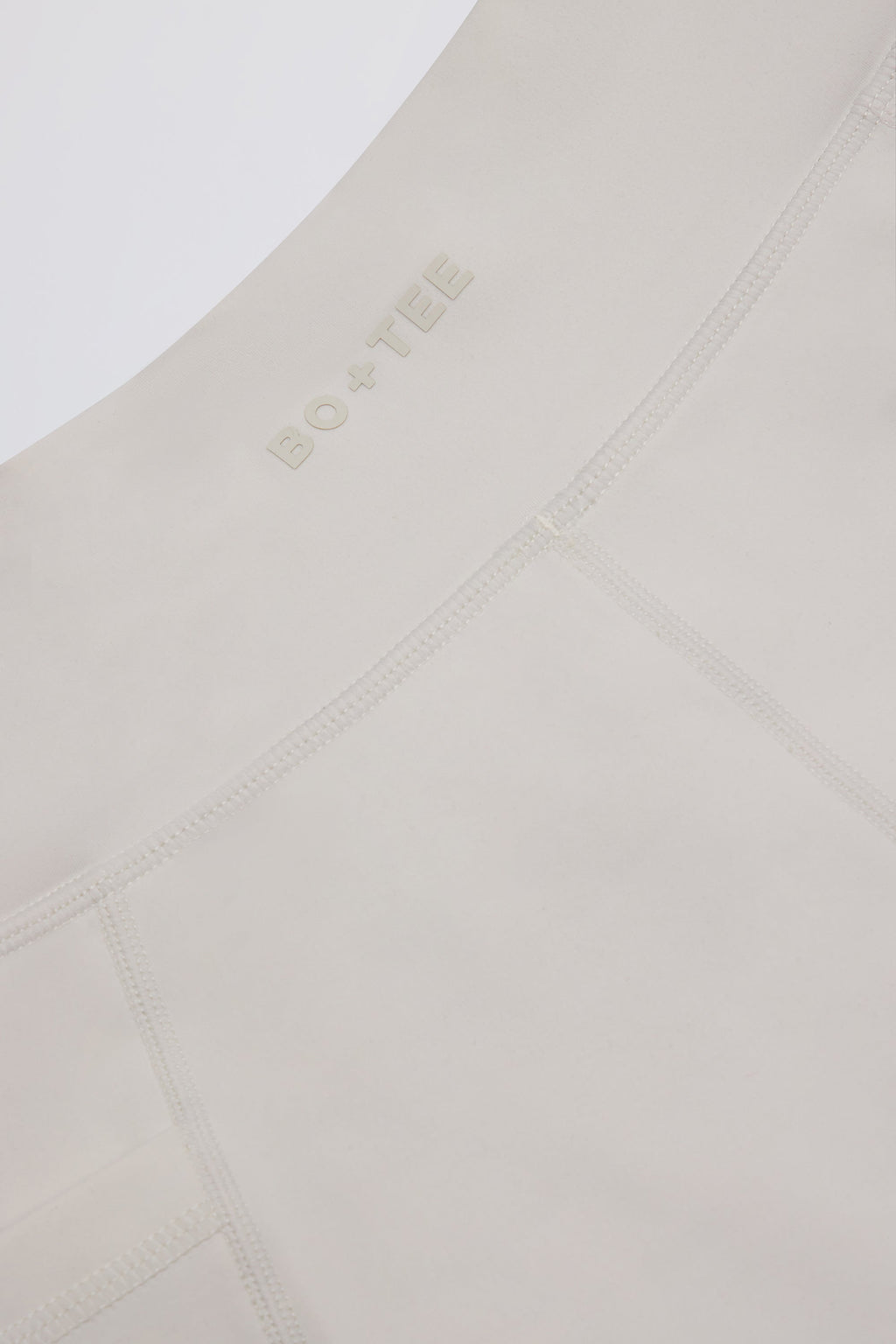 Soft Active Pocket V-Waist Mini Shorts in Cream