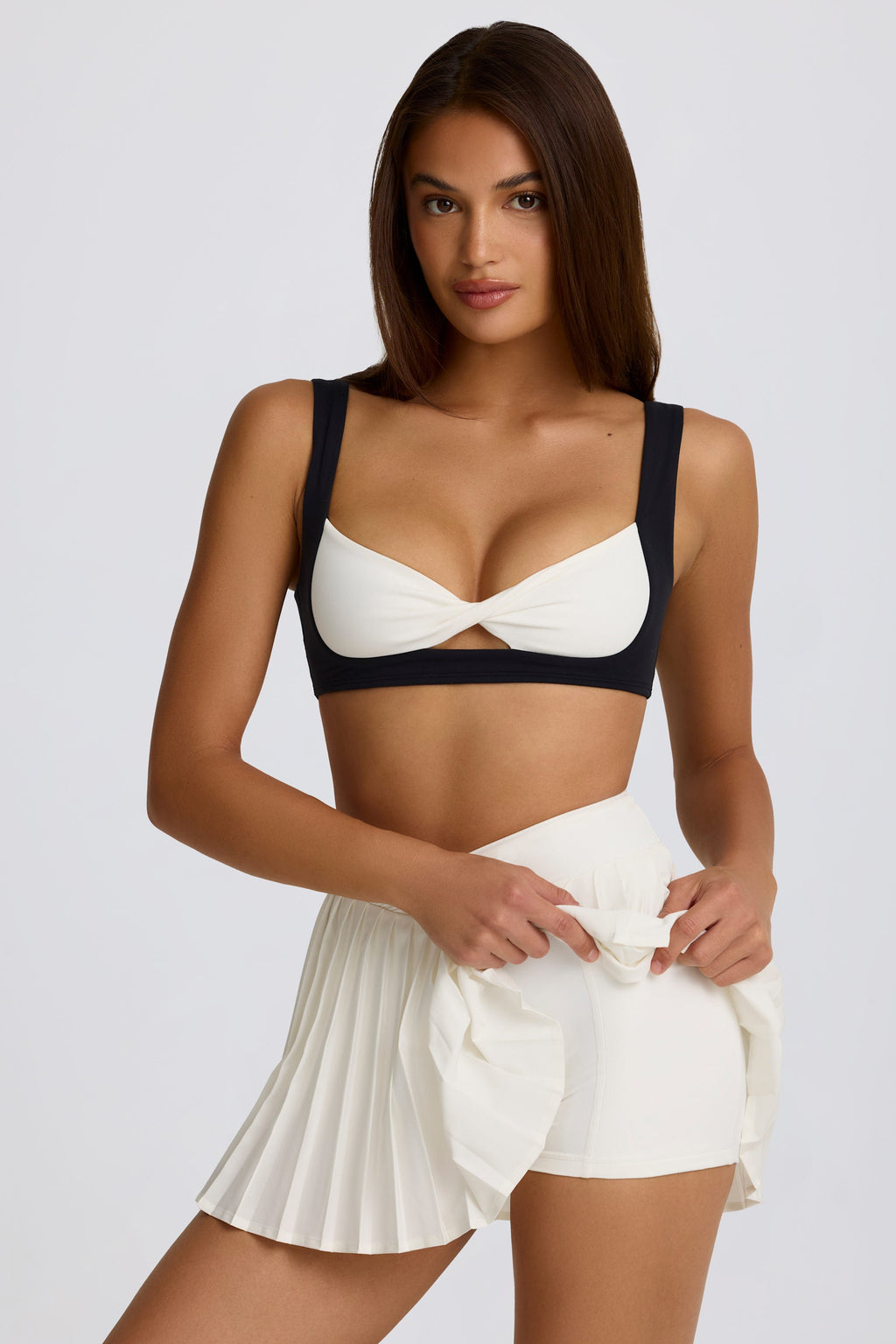 Soft Active Crossover Pleated Mini Skort in Ivory