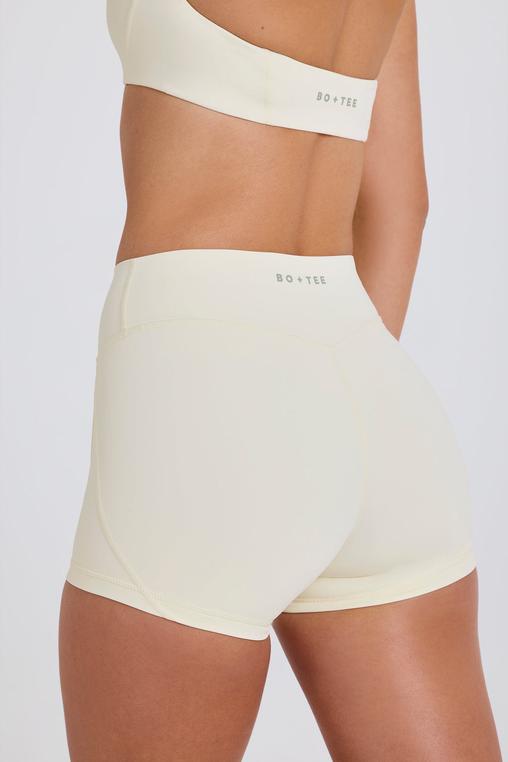 Four-Way Stretch High-Waist Mini Shorts in Cream