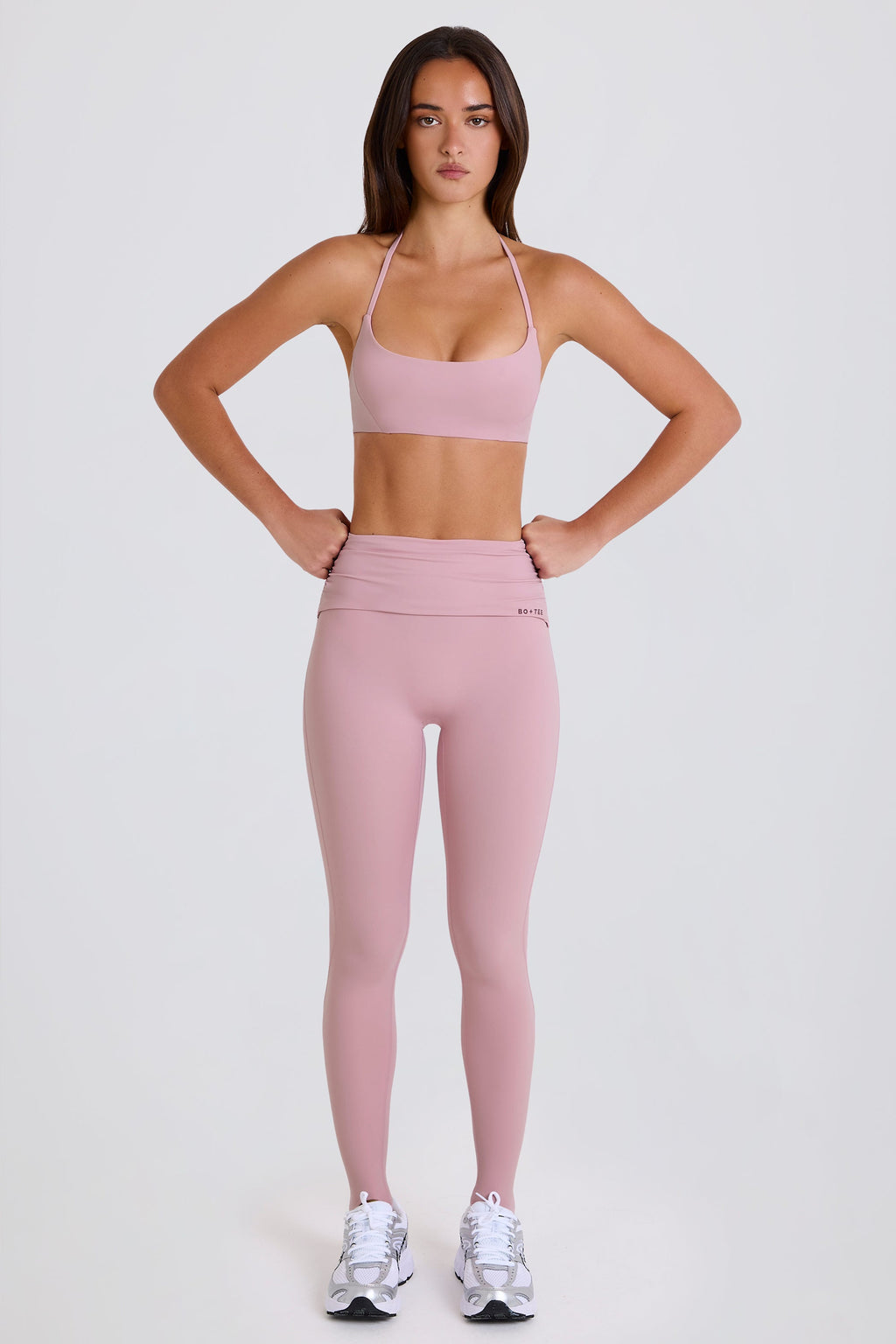 Four-Way Stretch Foldover Mid-Rise Stirrup Leggings in Mauve
