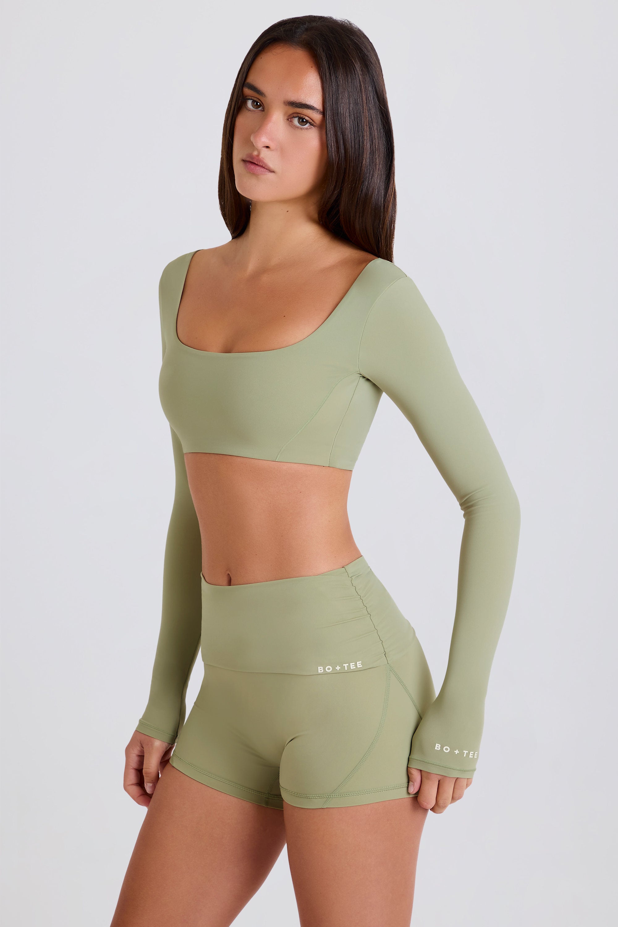Four-Way Stretch Foldover Mid-Rise Mini Shorts in Matcha
