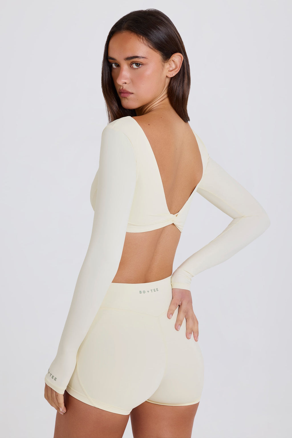 Four-Way Stretch Multiway Long-Sleeve Crop Top in Cream