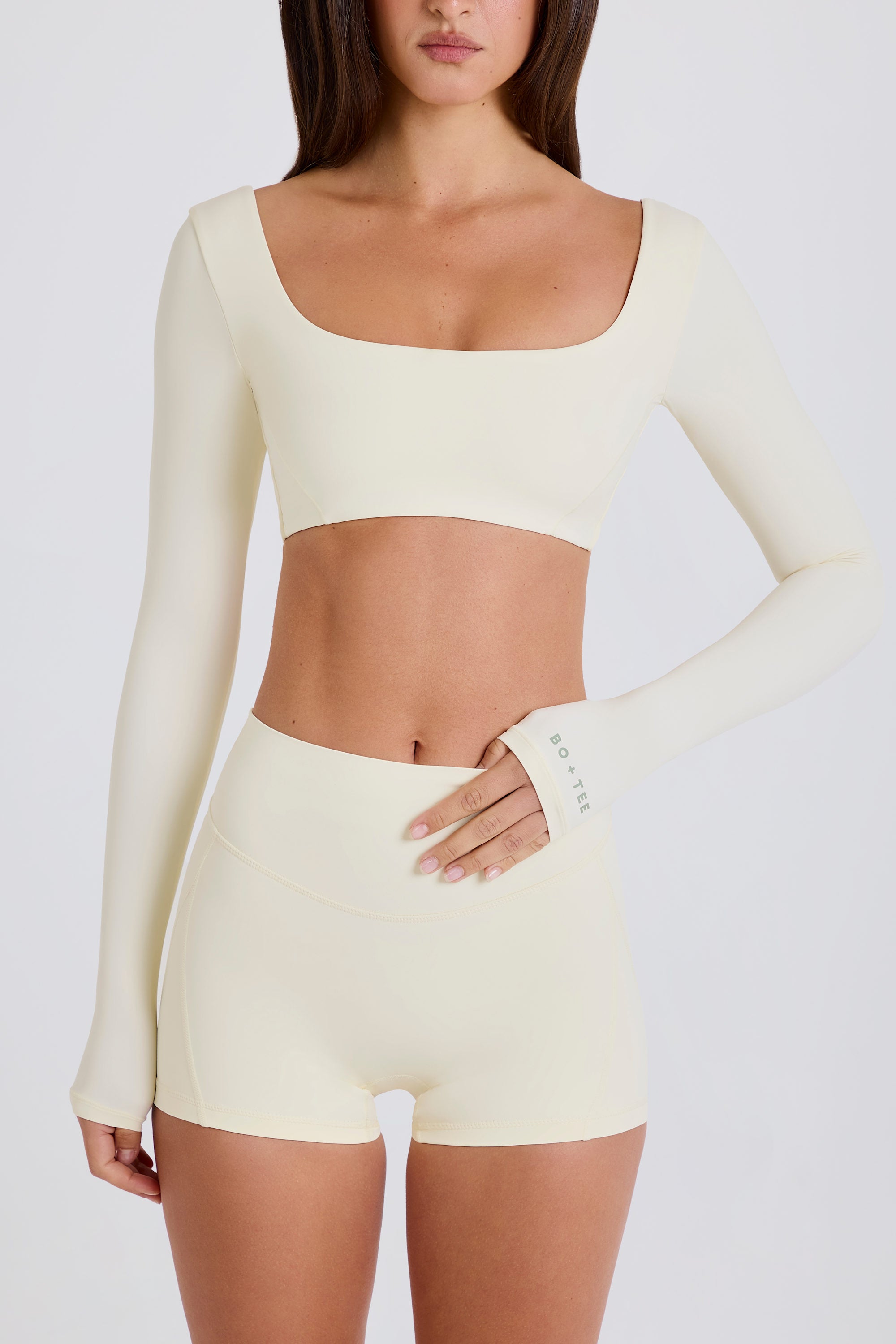 Four-Way Stretch Multiway Long-Sleeve Crop Top in Cream